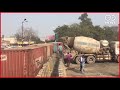 Delhi Police Put Cement Mixture Between Barricades