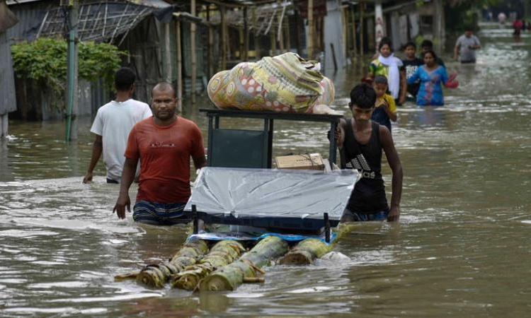 Flood devastation in 13 districts of Assam, 70 dea