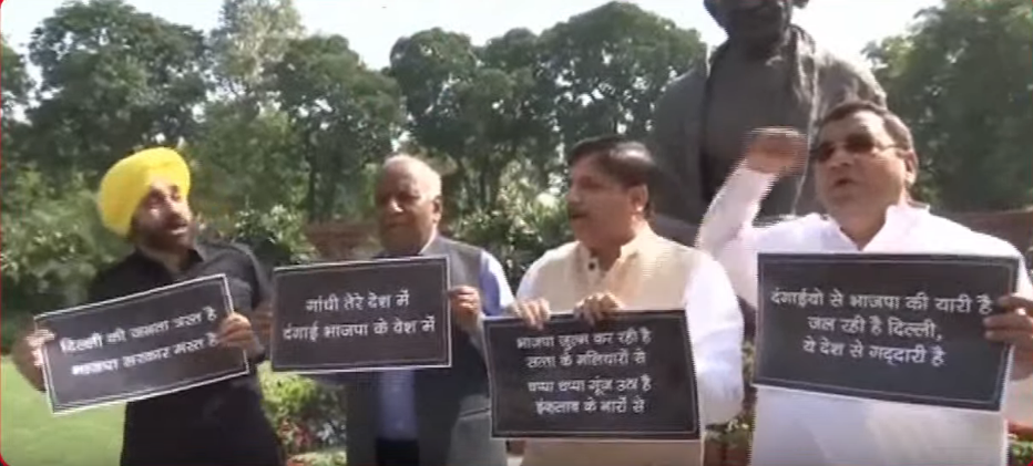 Deferred LIVE: Delhi Riots- MPs Protest at Parliam