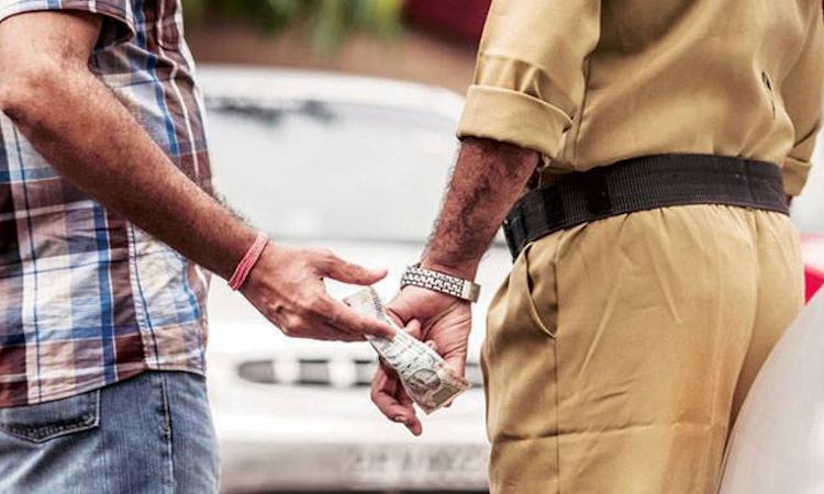 1 IN 2 INDIANS PAID BRIBES THIS YEAR, MOSTLY TO GO